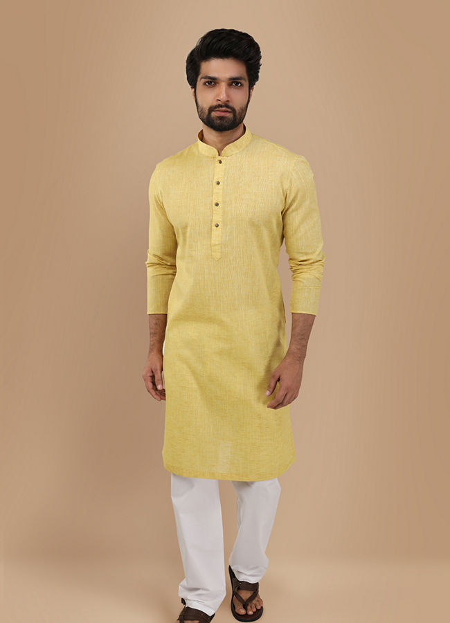 alt message - Manyavar Men Faded Yellow Solid Kurta image number 1